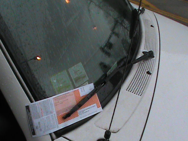 Ticket on windshield.
