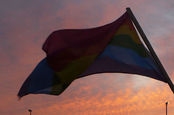 Pride Flag in the Sky at Sunset.