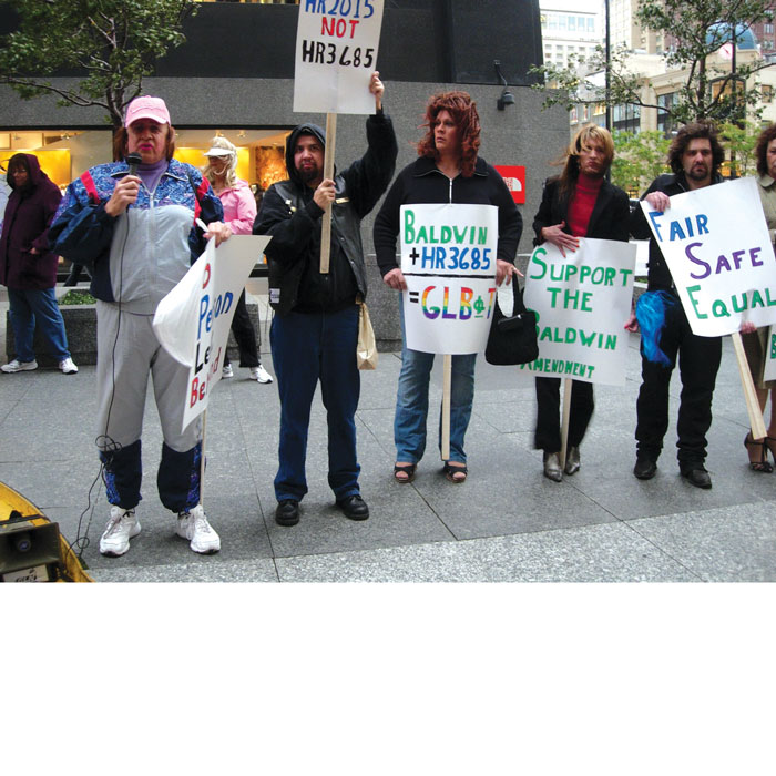 Trans-rights activists picket House Speaker Nancy Pelosi.